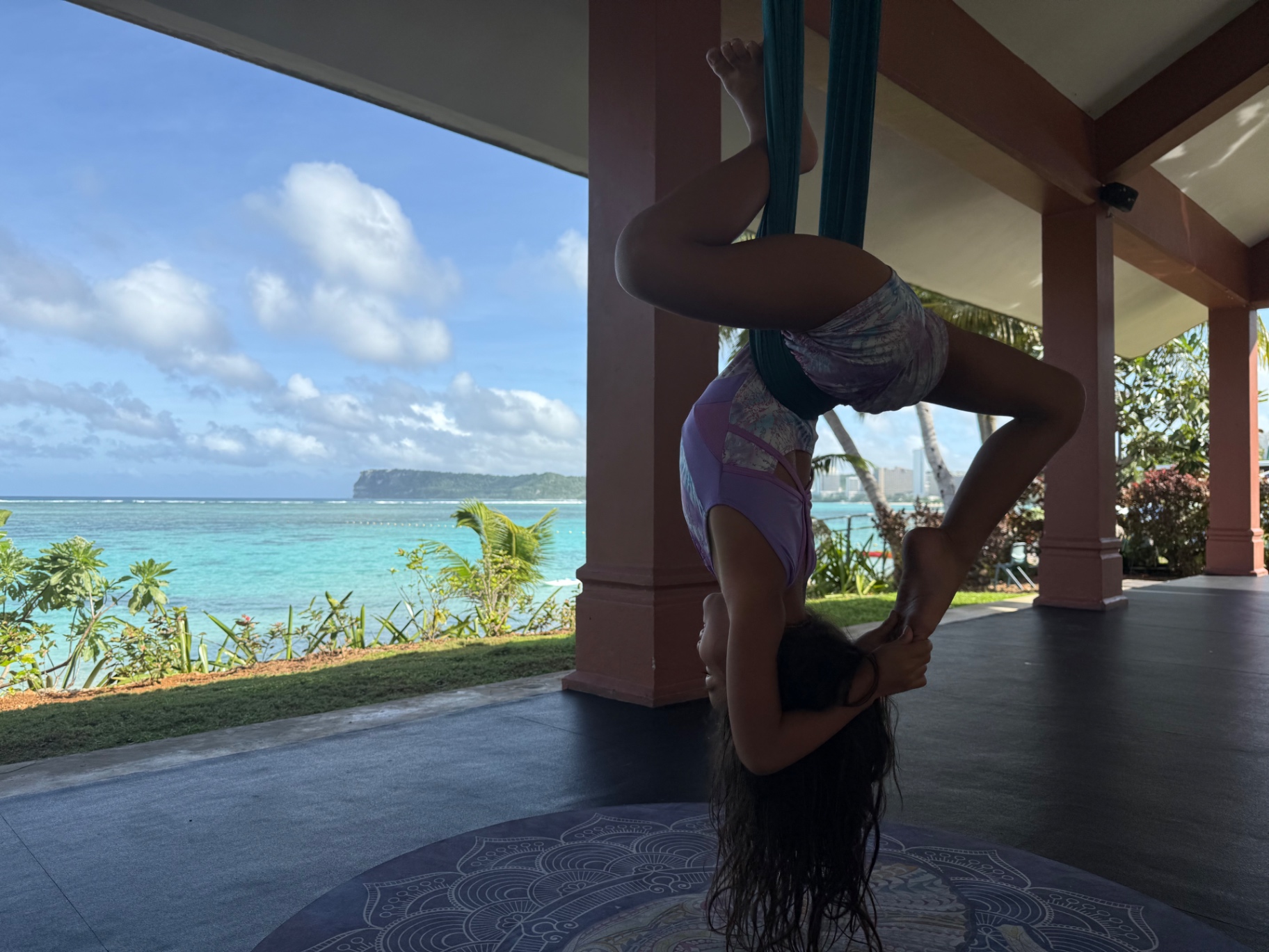 Aerial inversion above turquoise water