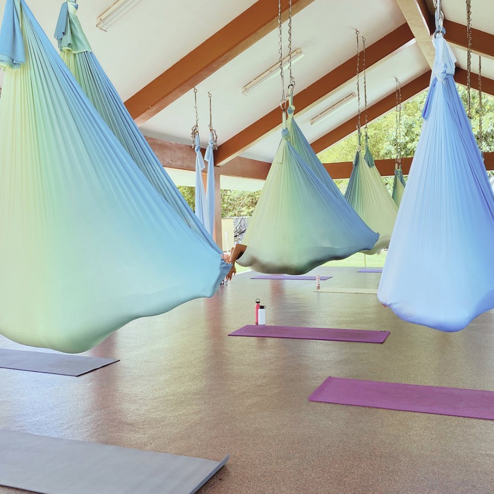 Pastel silks hanging in the pavilion